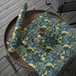 Decorative wrapping paper with floral pattern on a wooden table