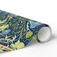 Roll of decorative paper with a floral pattern on a white background