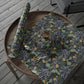 Decorative wrapping paper with floral pattern on a wooden table