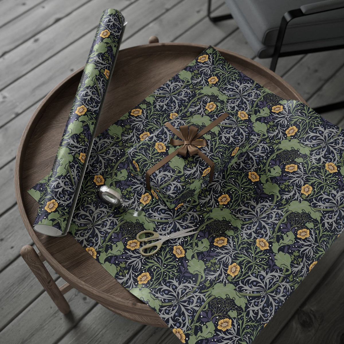 Decorative wrapping paper with floral pattern on a wooden table