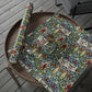 Floral-patterned fabric on a wooden surface