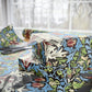 Floral-patterned fabric with scissors on a table