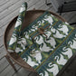 Decorative wrapping paper with swan pattern on a wooden tray