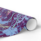 Roll of colorful patterned paper on a white background