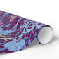 Roll of colorful patterned paper on a white background