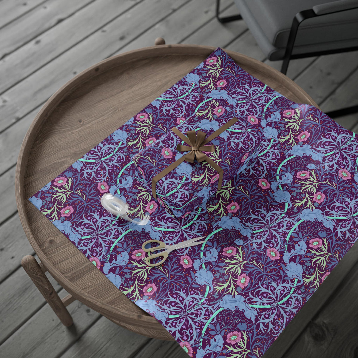 Floral-patterned wrapping paper n a wooden tray with cutlery