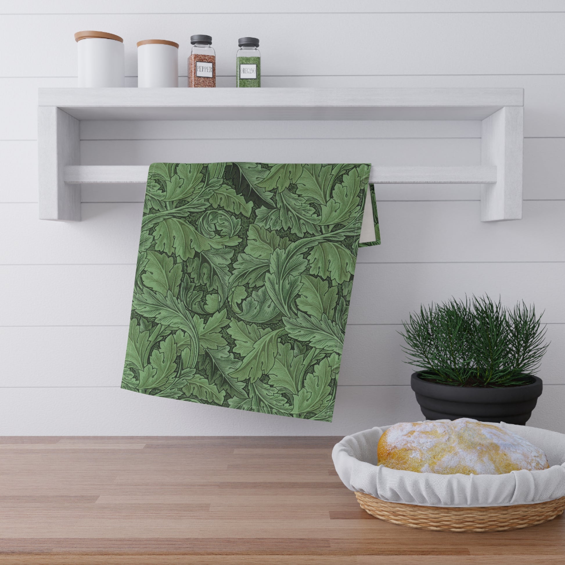 A green kitchen tea towel with a floral Art Nouveau pattern inspired by William Morris - Acanthus Collection.