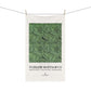 White towel with green leaf pattern and 'William Morris & Co' branding on a white background