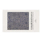 Decorative mat with floral pattern and 'William Morris & Co' branding on a white background