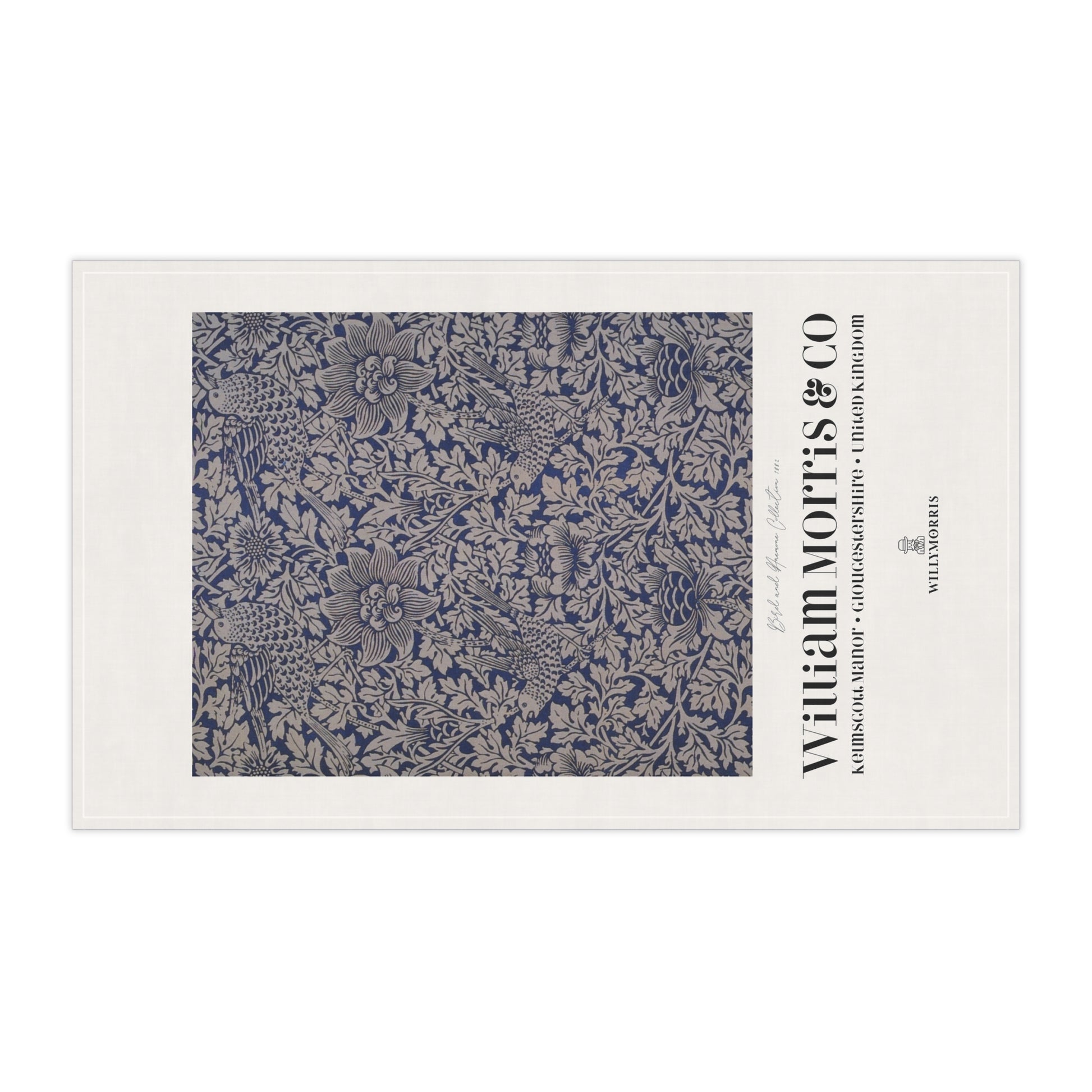 Decorative mat with floral pattern and 'William Morris & Co' branding on a white background
