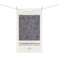White towel with blue floral pattern and 'William Morris & Co' branding on a white background