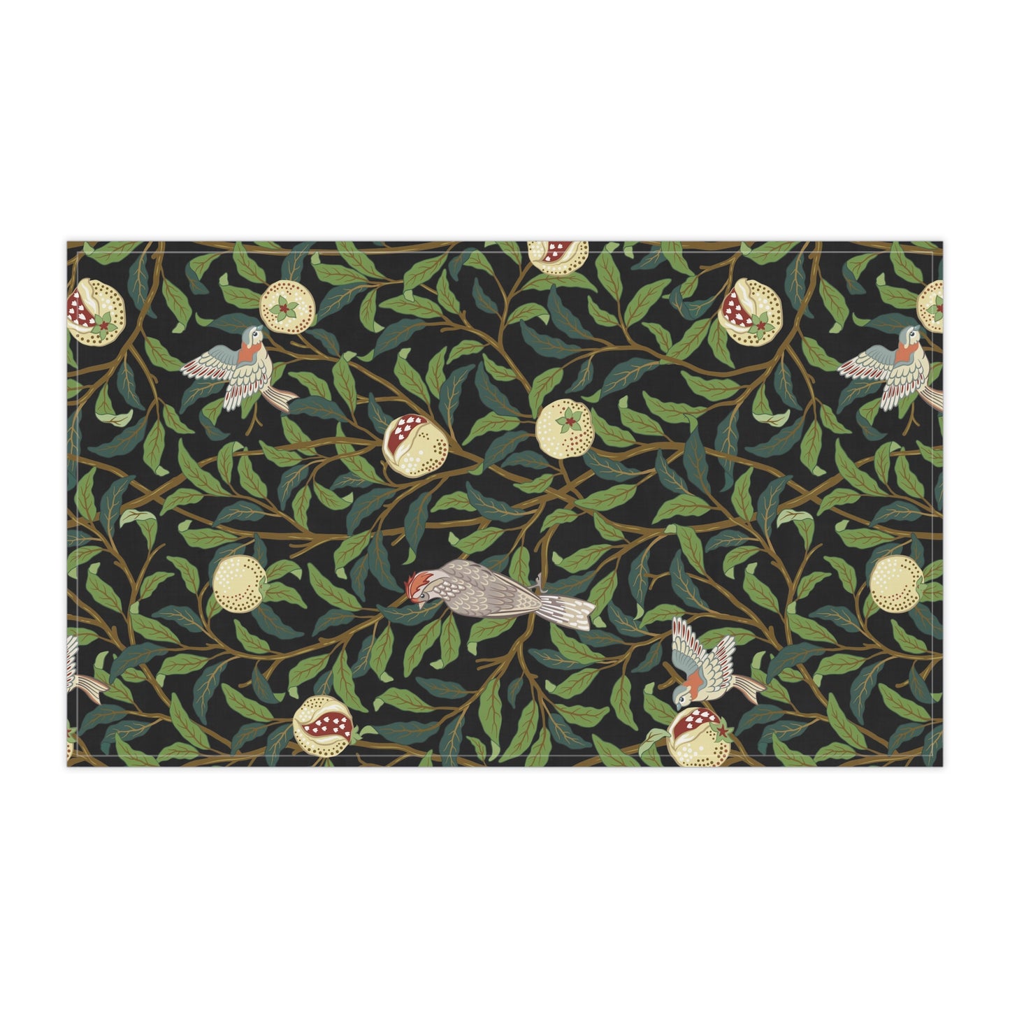 A kitchen tea towel with a design inspired by William Morris, featuring birds and pomegranate patterns on a dark background.