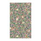 A kitchen tea towel with a floral and pomegranate design, inspired by the Art Nouveau style of William Morris.