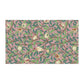 A kitchen tea towel with a floral and pomegranate design, inspired by the Art Nouveau style of William Morris.