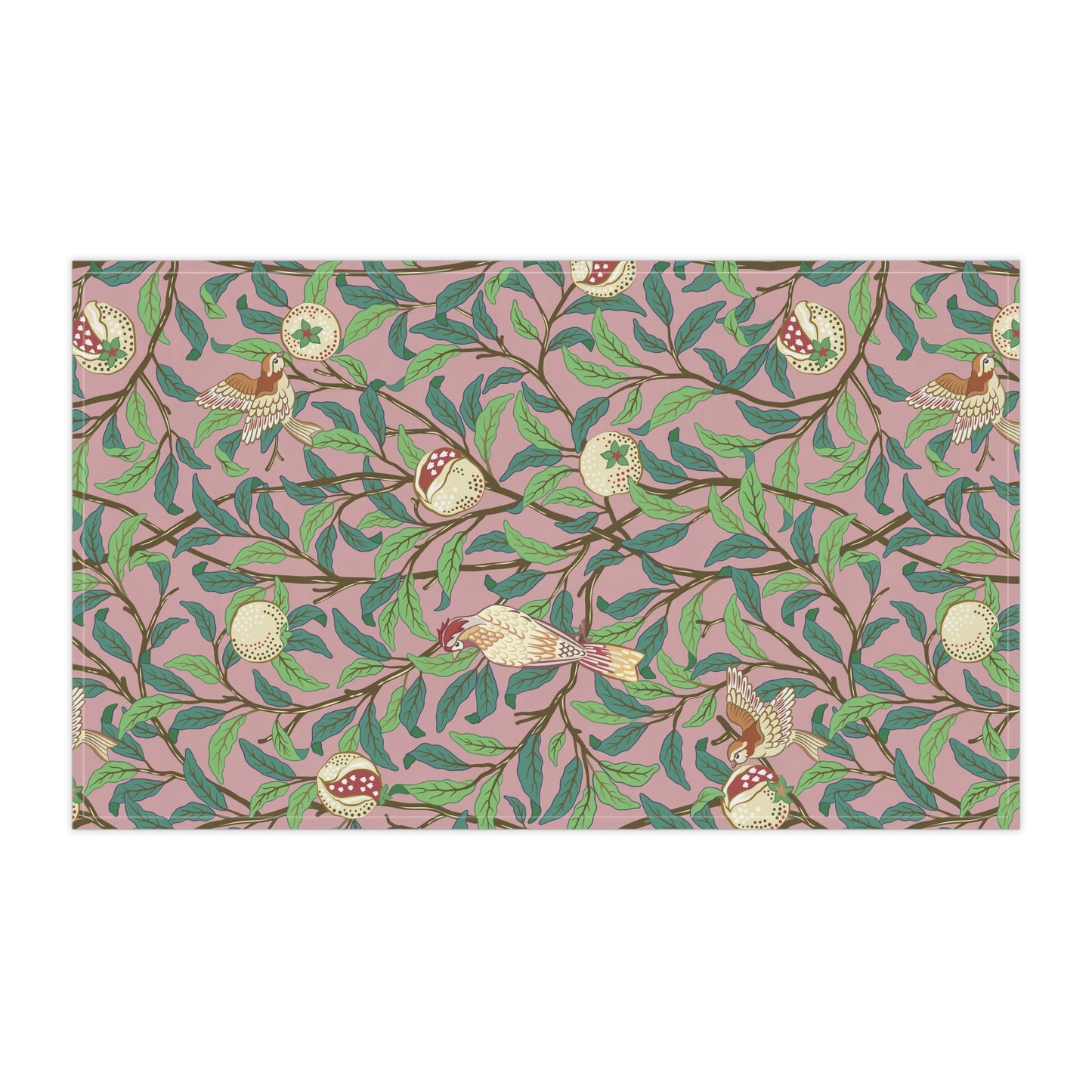 A kitchen tea towel with a floral and pomegranate design, inspired by the Art Nouveau style of William Morris.