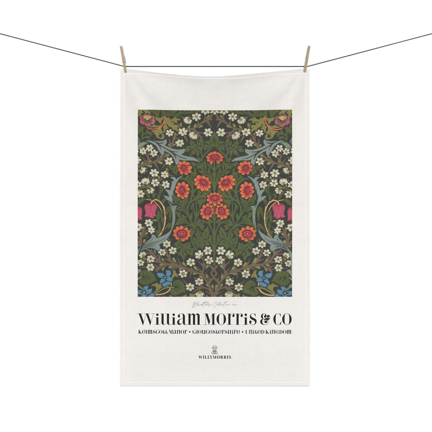 Floral patterned towel with 'William Morris & Co' branding on a white background