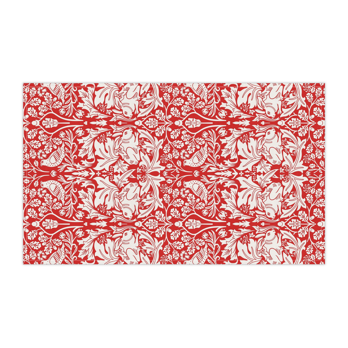 A rectangular tea towel featuring a bold red and off-white floral and botanical pattern, shown flat against a plain white background.