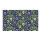 A kitchen tea towel with a floral William Morris & Co pattern featuring blue and green colours on a beige background.