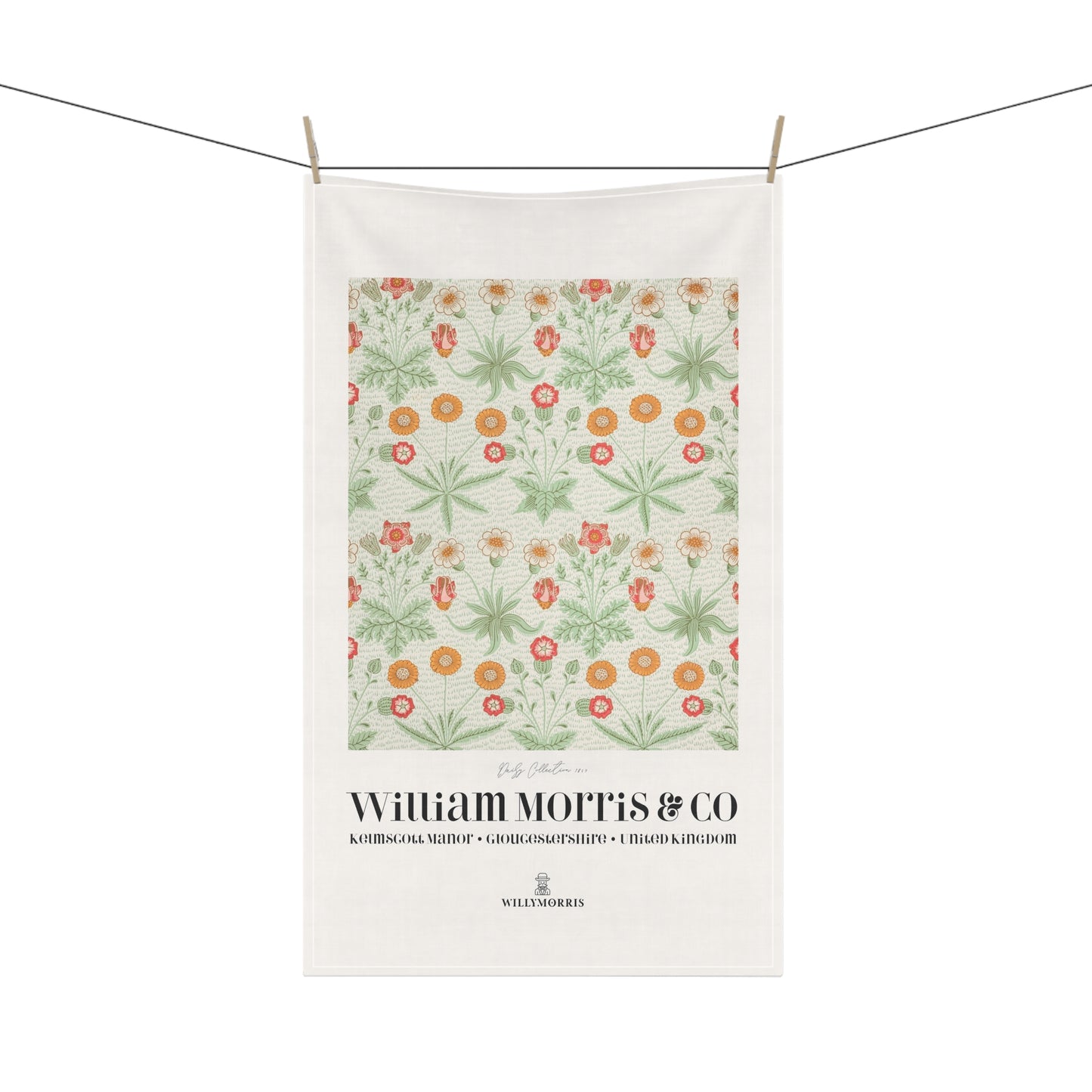 Floral patterned towel with 'William Morris & Co' branding on a white background