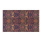 A kitchen tea towel with a floral and geometric pattern, predominantly in pink and purple colours.