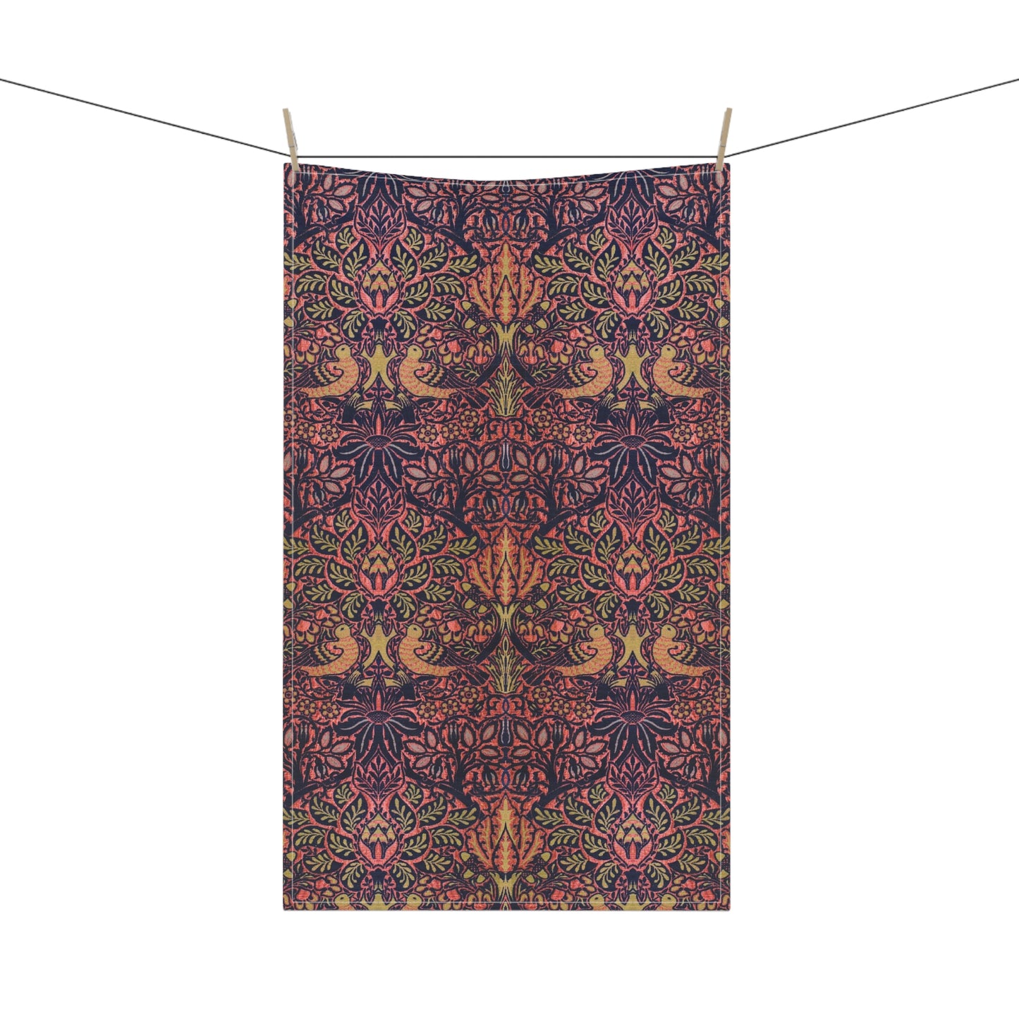 A kitchen tea towel with a floral and geometric pattern, predominantly in pink and purple colours.