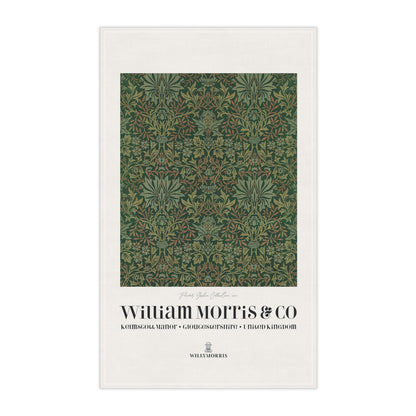 Tea towel with green pattern and 'William Morris & Co' branding on a white background