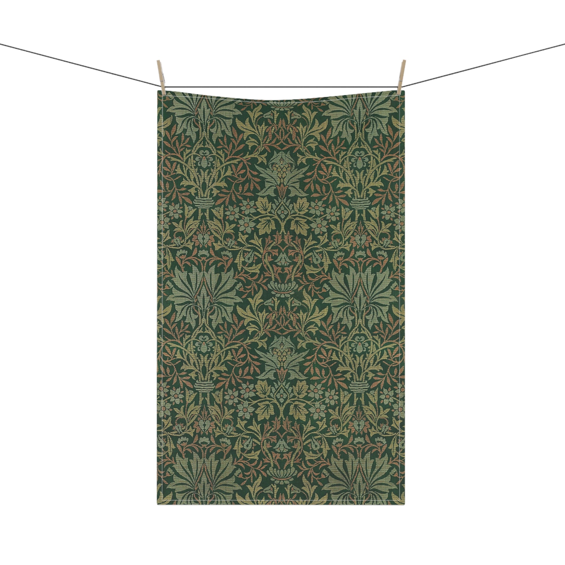 A kitchen tea towel with a floral garden pattern inspired by William Morris.
