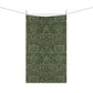 A kitchen tea towel with a floral garden pattern inspired by William Morris.
