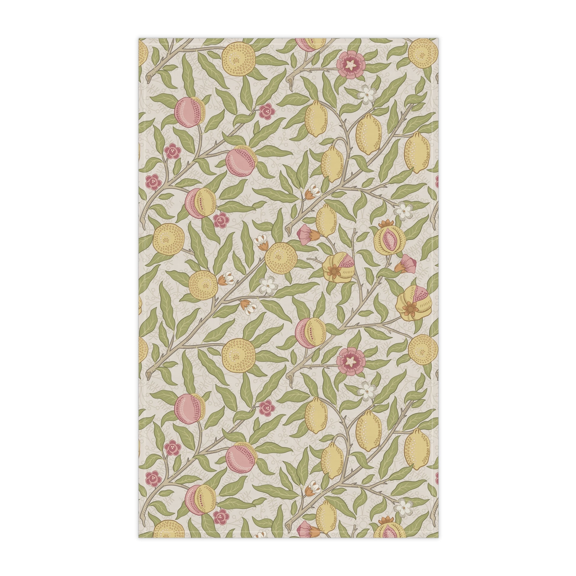 Patterned fabric with lemons, leaves, and flowers on a white background