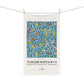 Tea towel with floral design and 'William Morris & Co' branding on a white background