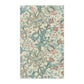 A rectangular tea towel featuring a classic Art Nouveau floral pattern with light blue lilies, coral-pink blossoms, and green stems on a warm cream background.