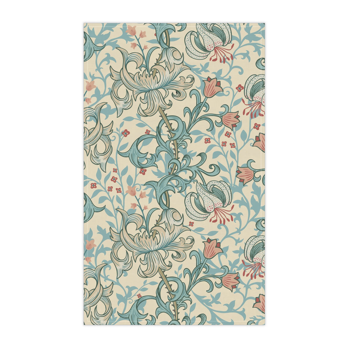 A rectangular tea towel featuring a classic Art Nouveau floral pattern with light blue lilies, coral-pink blossoms, and green stems on a warm cream background.