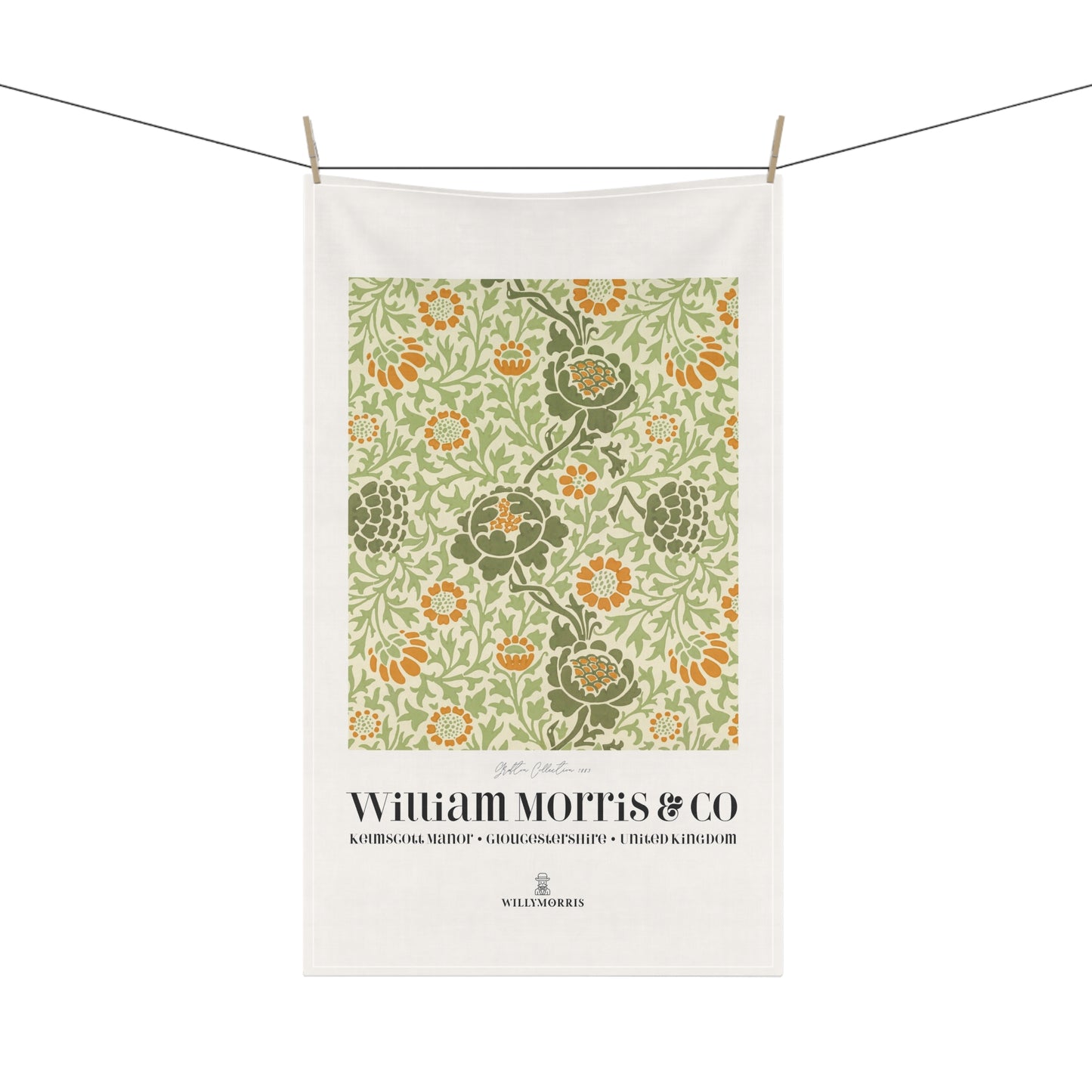 Floral patterned towel with 'William Morris & Co' branding on a white background