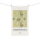 Floral patterned towel with 'William Morris & Co' branding on a white background