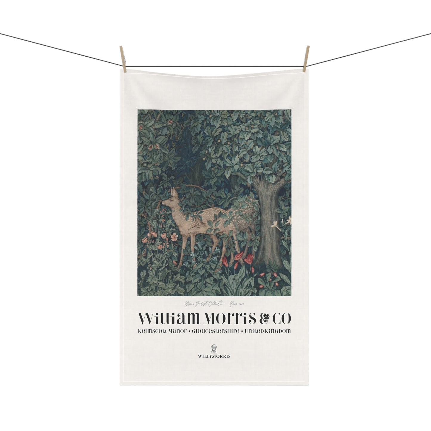 Tea towel with deer design and William Morris & Co branding on a white background