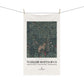 Decorative towel with nature-themed design and 'William Morris & Co' branding on a white background.