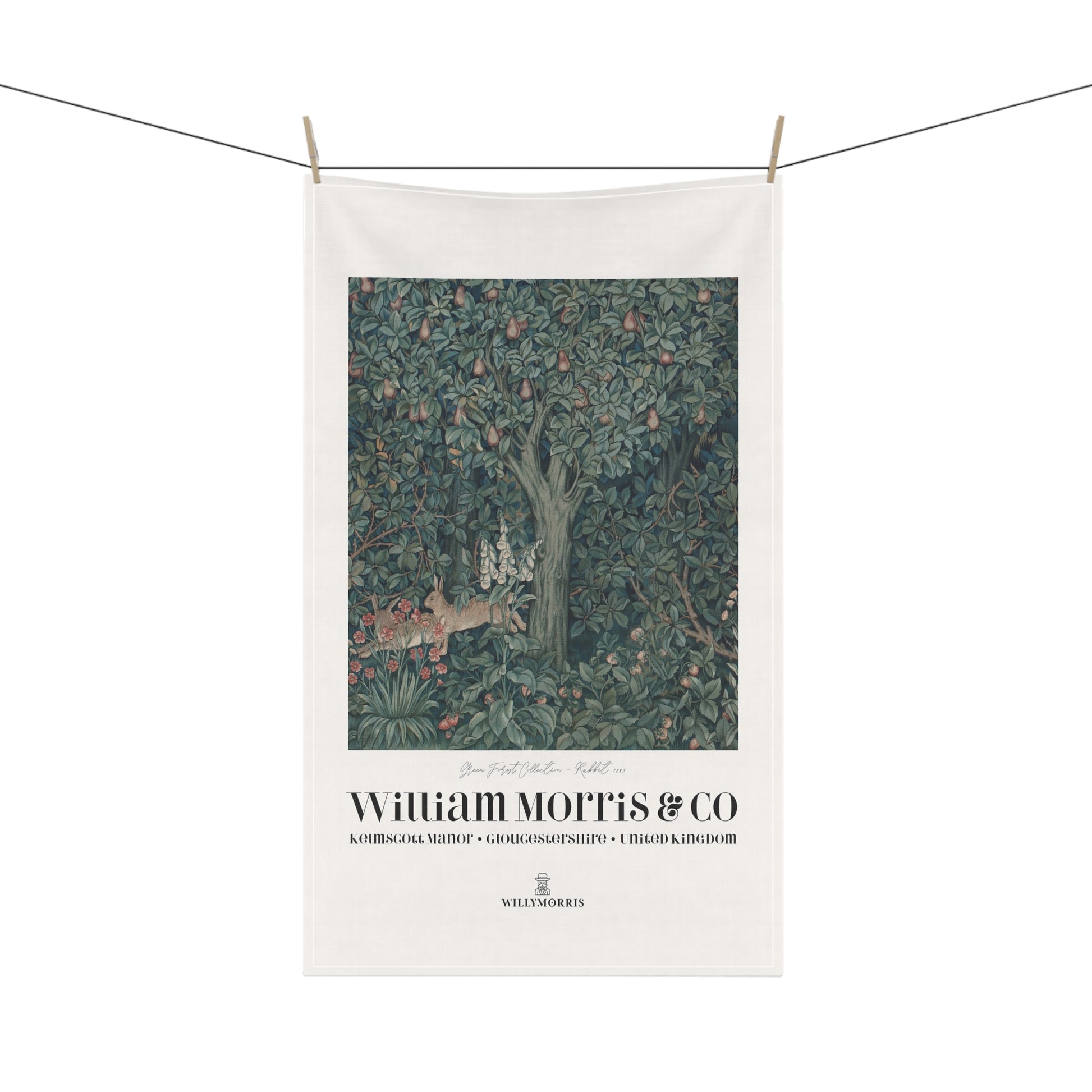 Tea towel with nature design and 'William Morris & Co' branding on a white background
