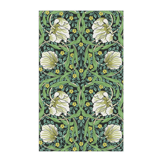A kitchen tea towel with a green background and a floral pattern inspired by William Morris - Pimpernel Collection.