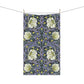 A kitchen tea towel with a floral pattern inspired by William Morris - Pimpernel Collection in lavender colour.