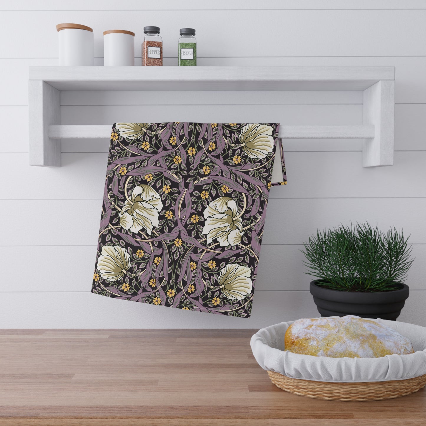 A kitchen tea towel with a floral pattern inspired by William Morris - Pimpernel Collection in a rosewood colour.