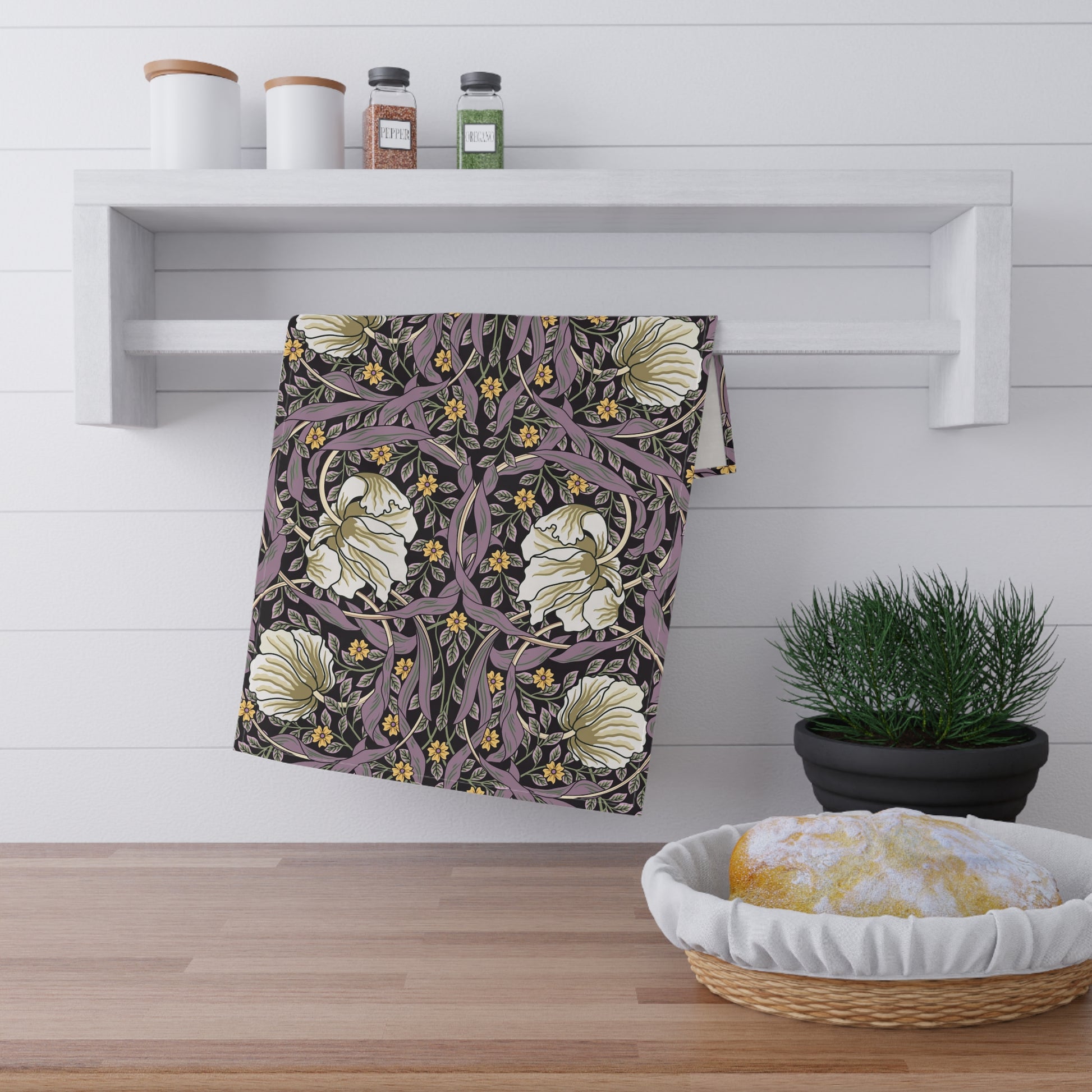 A kitchen tea towel with a floral pattern inspired by William Morris - Pimpernel Collection in a rosewood colour.
