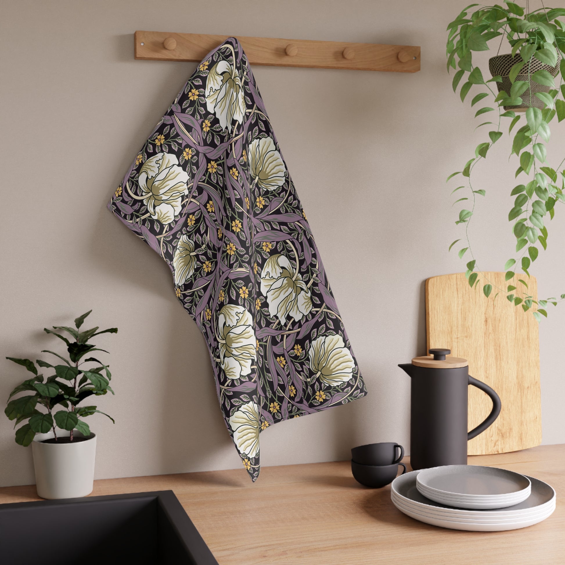 A kitchen tea towel with a floral pattern inspired by William Morris - Pimpernel Collection in a rosewood colour.