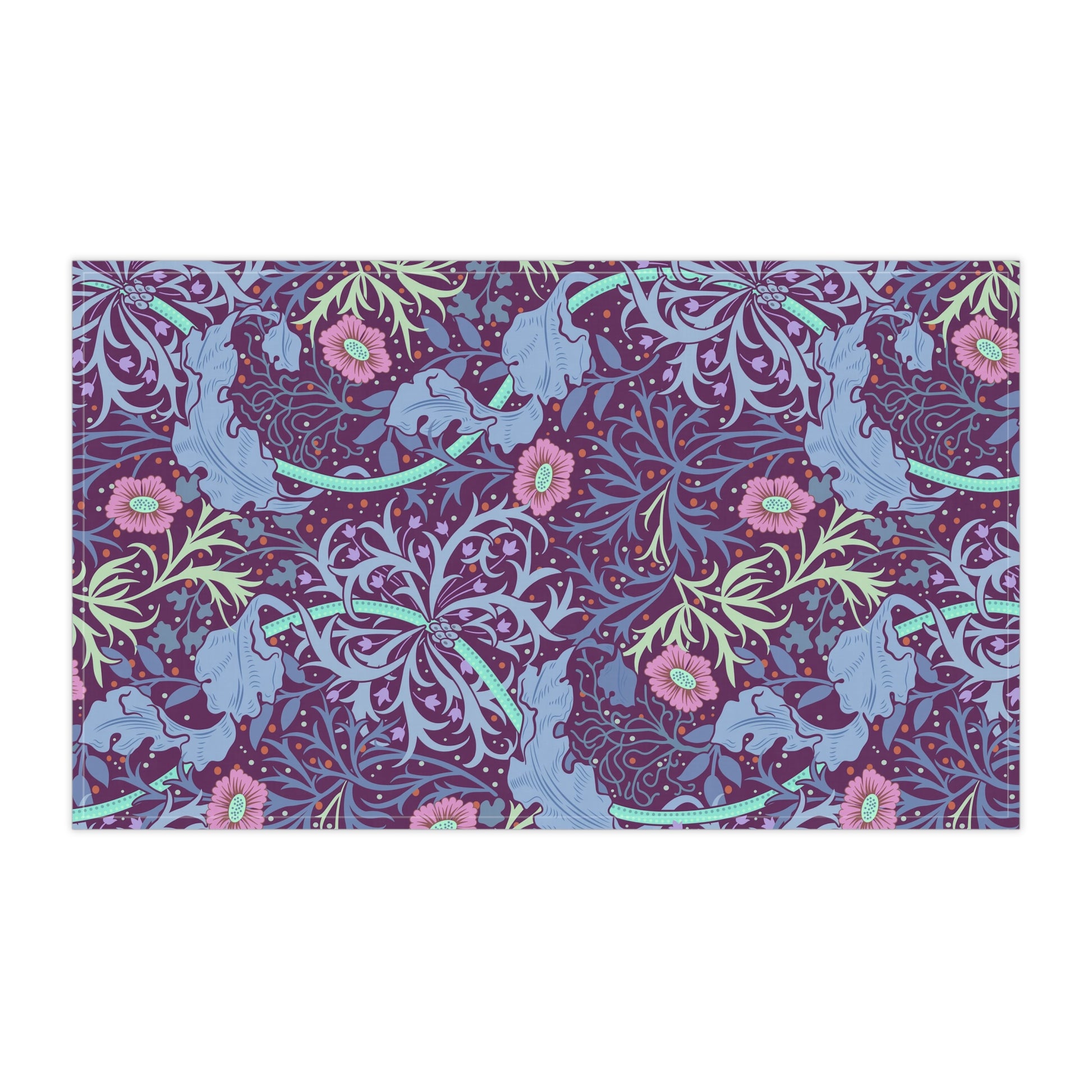 A kitchen tea towel featuring a repeating pattern of seaweed and pink flowers on a purple background.