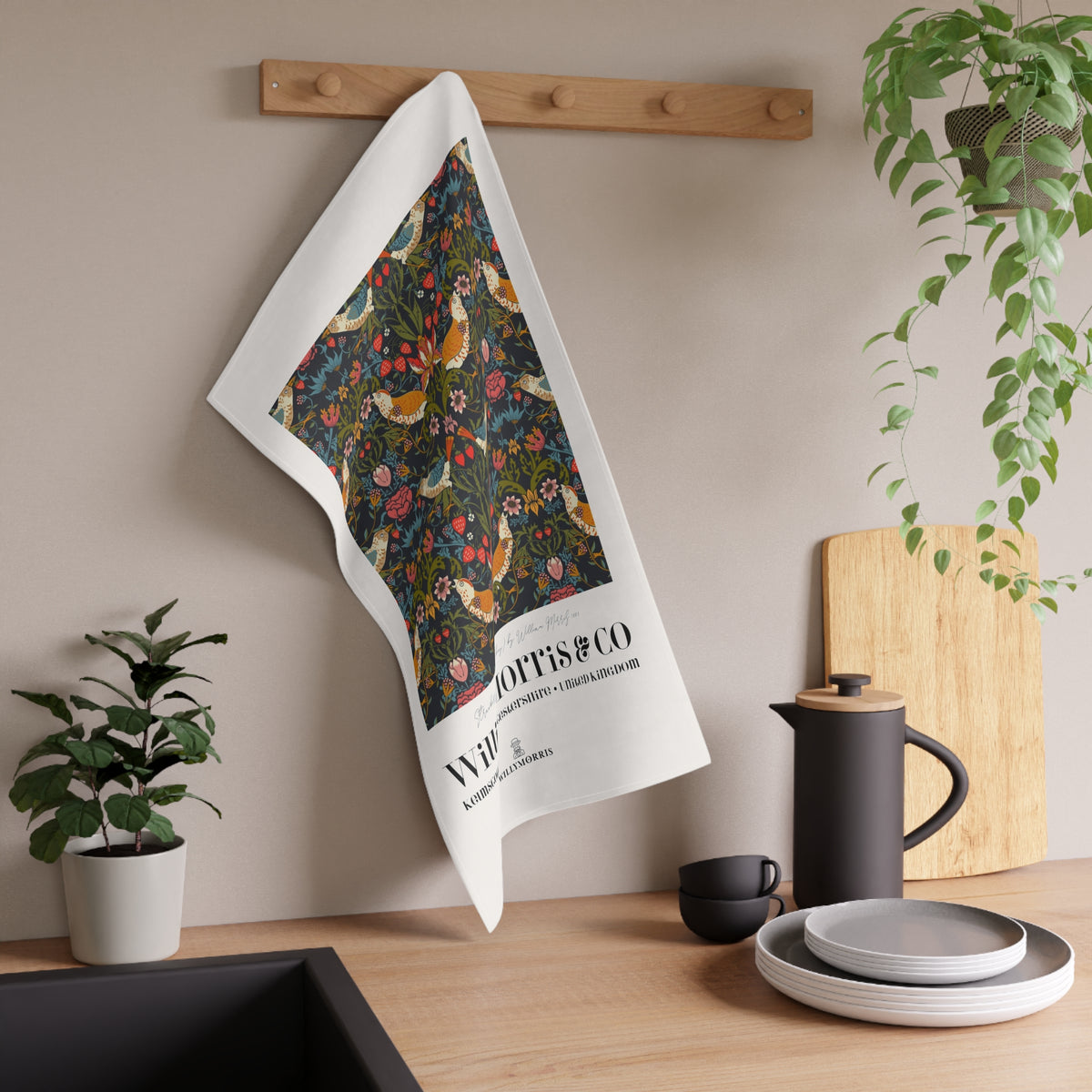 Kitchen Tea Towel designed by William Morris & Co in a red, blue, green and yellow floral pattern called Strawberry Thief Collection - Art Print on a Tea Towel