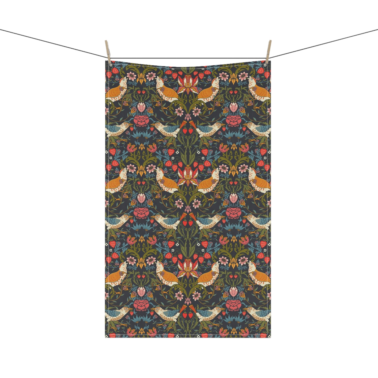 A kitchen tea towel with a repeating pattern featuring birds, flowers, and leaves in dark background, inspired by William Morris' Strawberry Thief design.