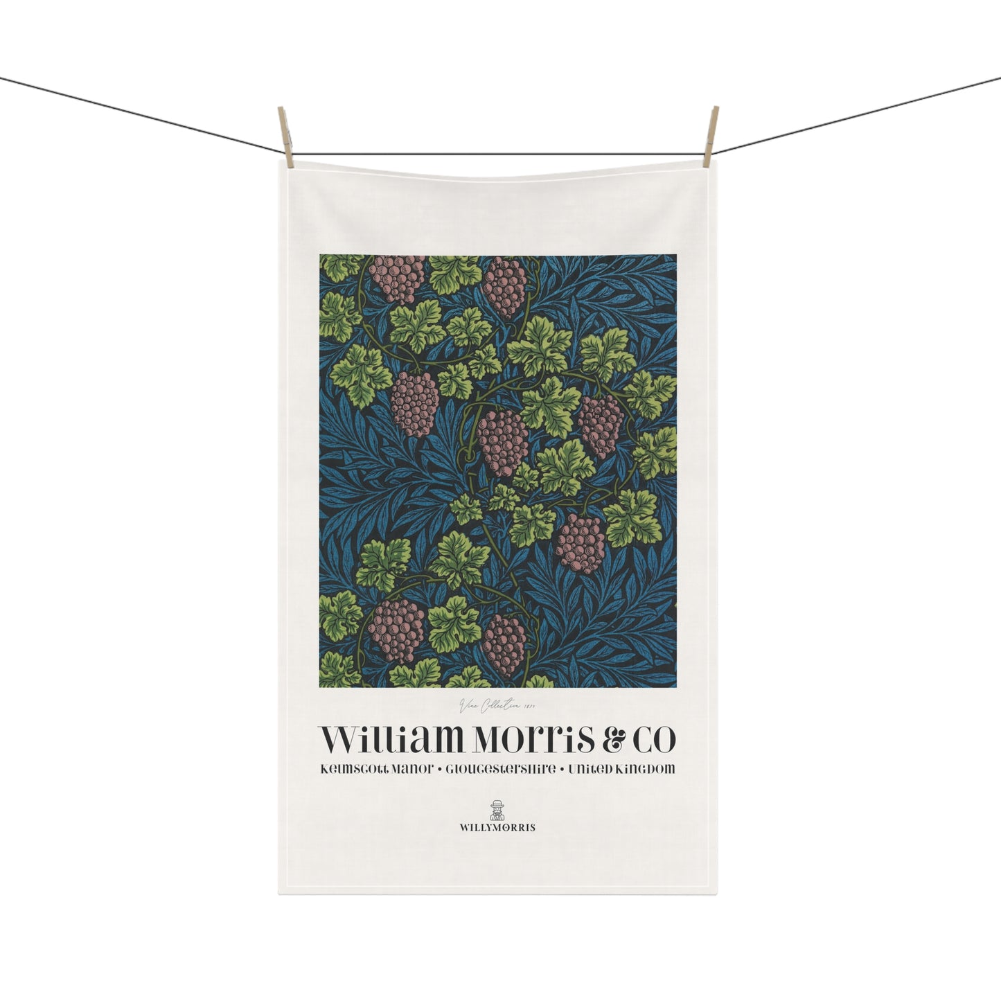 Tea towel with floral design and 'William Morris & Co' branding on a white background