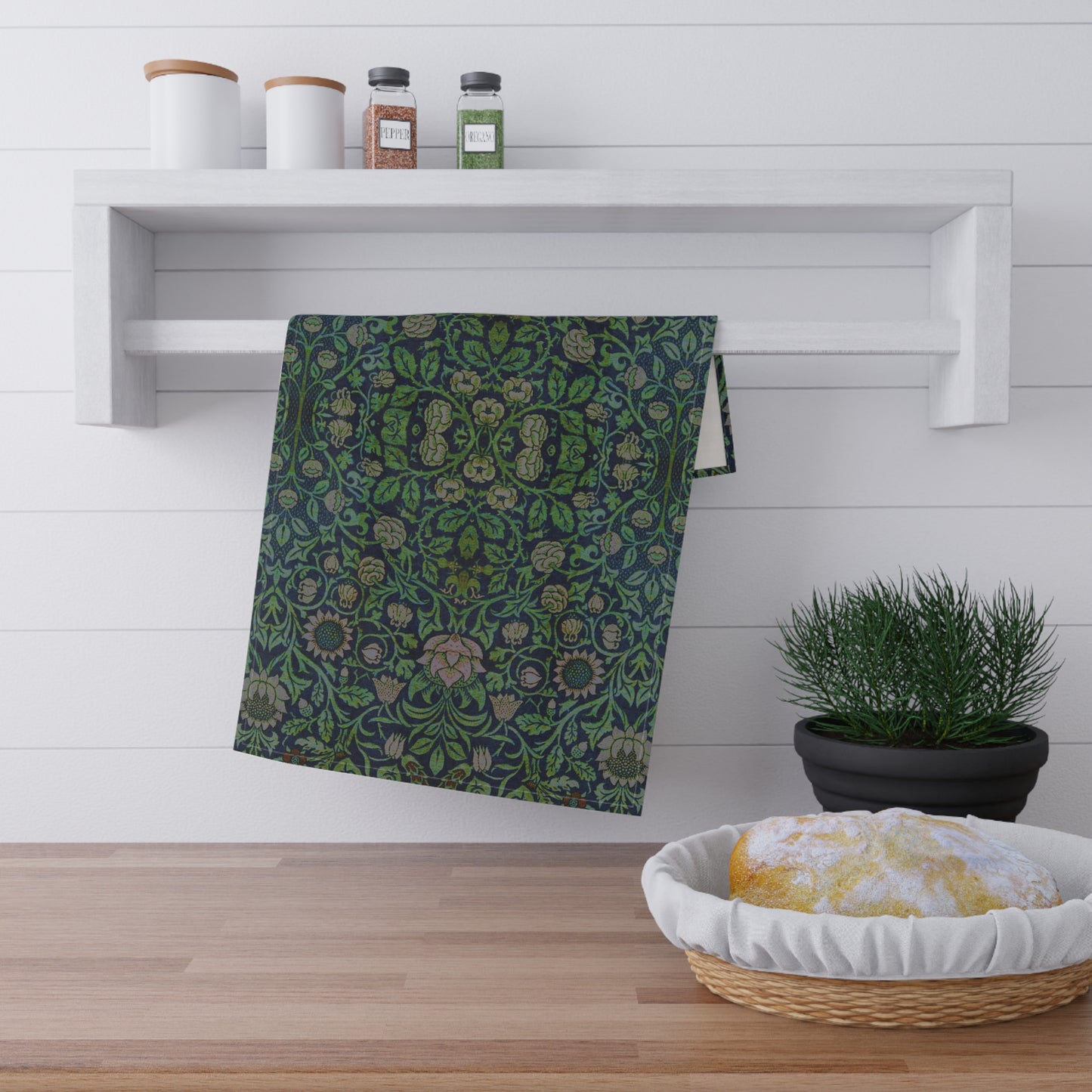 A kitchen tea towel with a green and violet floral pattern inspired by William Morris - Violet and Columbine Collection.
