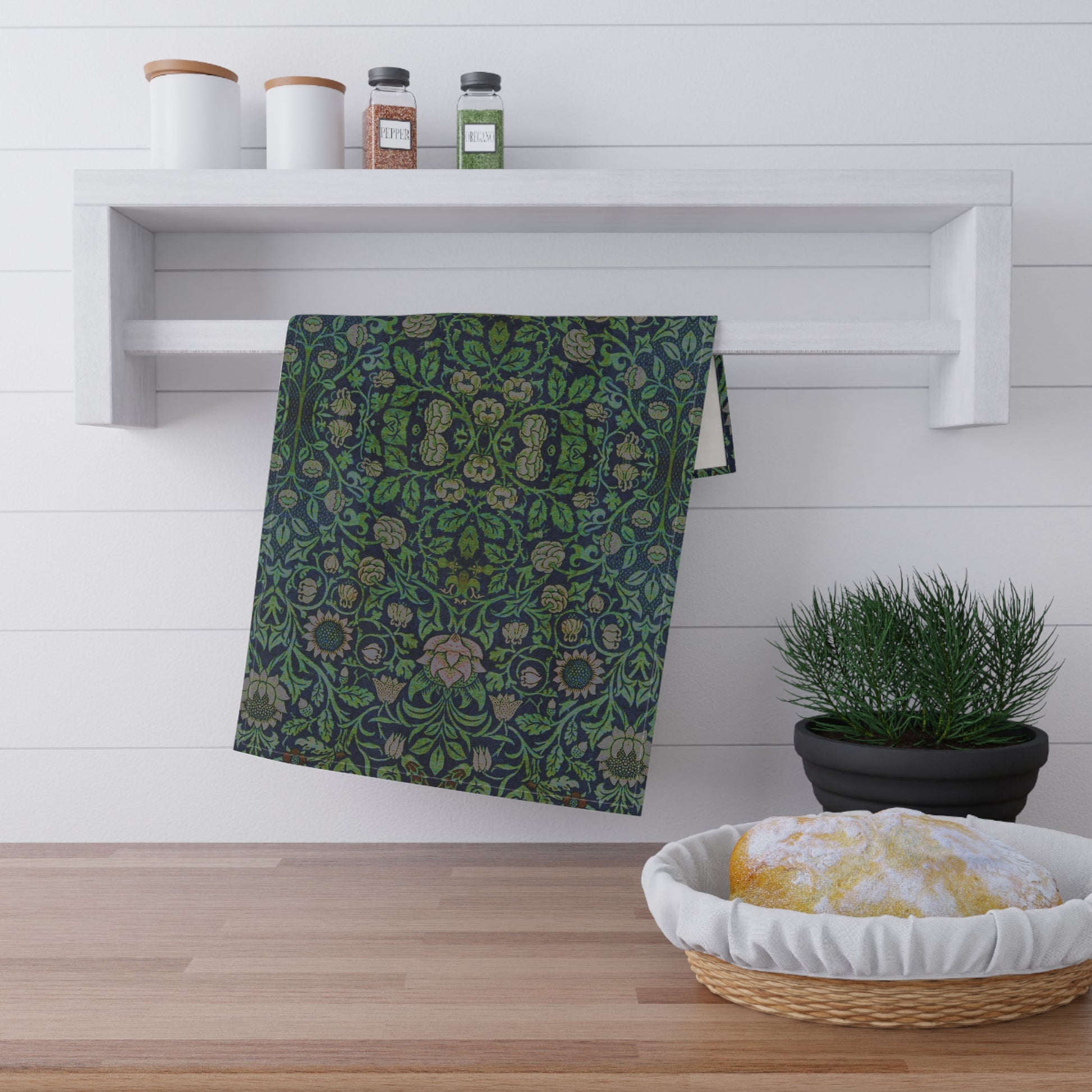 A kitchen tea towel with a green and violet floral pattern inspired by William Morris - Violet and Columbine Collection.