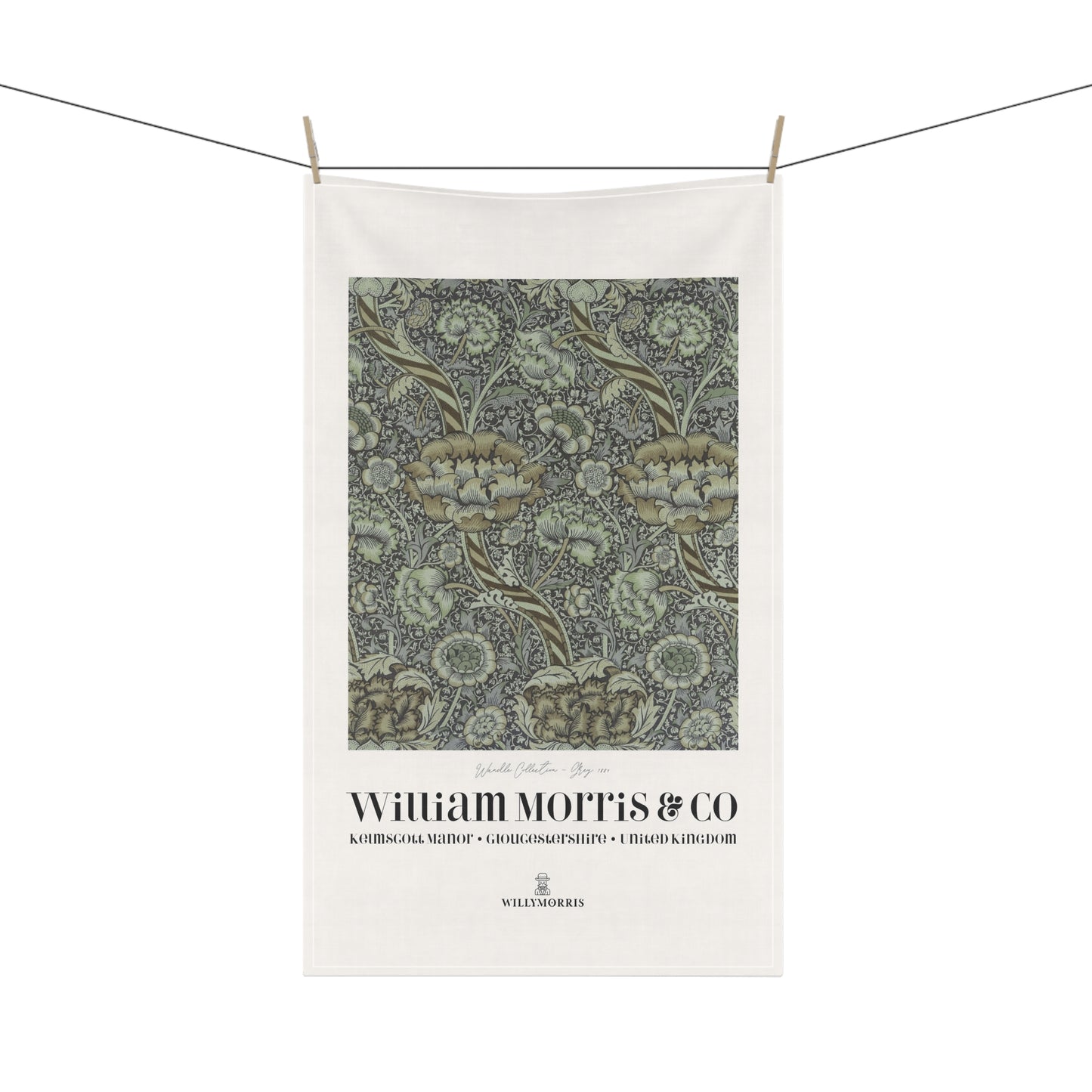 Tea towel with floral pattern and 'William Morris & Co' branding on a white background