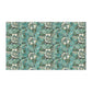 A kitchen tea towel with a floral pattern inspired by William Morris, in shades of blue, green, and white.